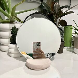 Elegant Round Mirror with Ceramic Base